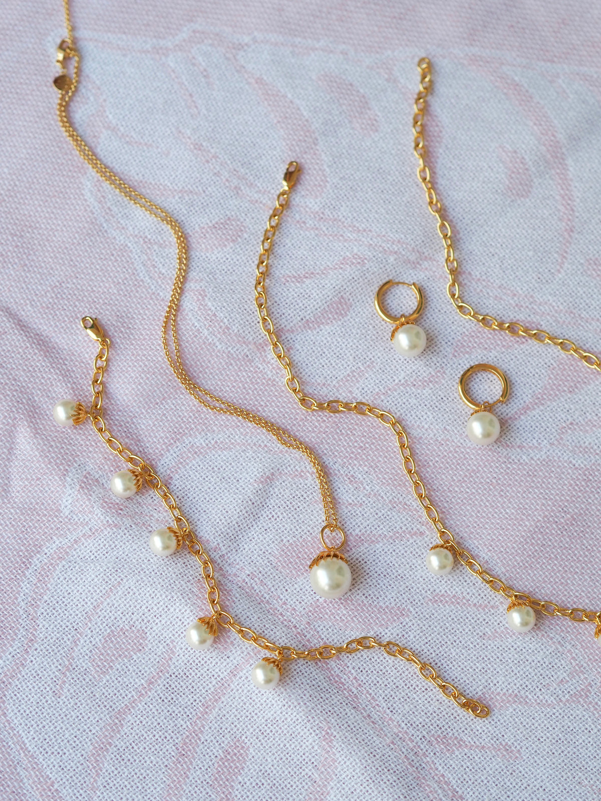 Single Palm Pearl Necklace, Bracelet, and Earrings