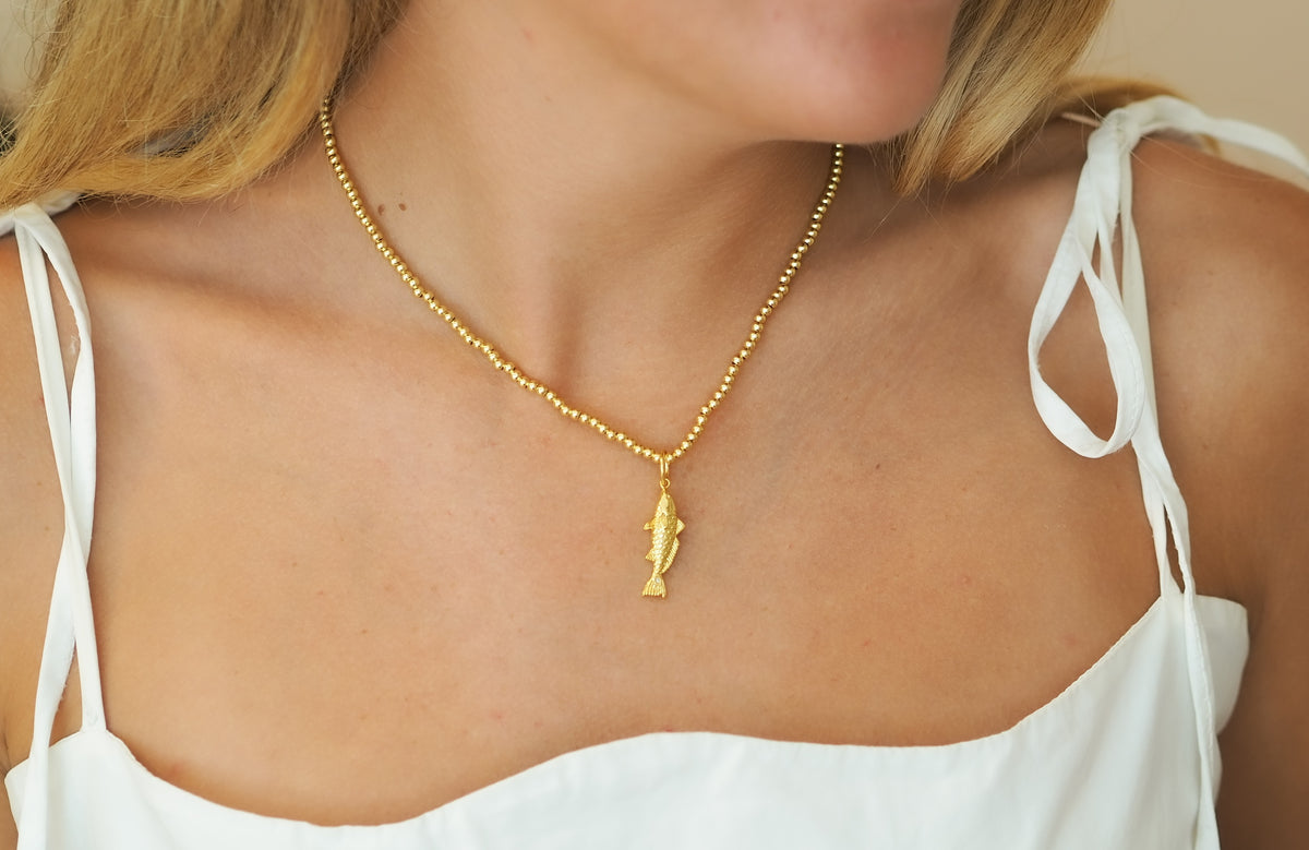 beaded ball necklace with redfish charm